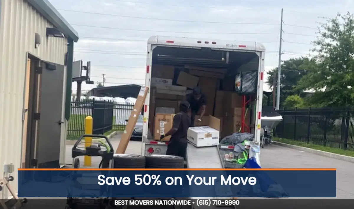 JM Moving crew loading a box truck for a long-distance move